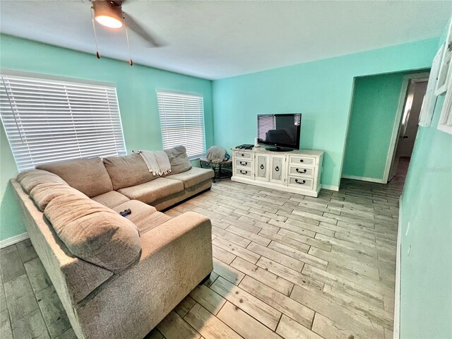 3265 Sunrise Trl, Port Charlotte, FL 33952 - living area with ceiling fan and wood finished floors