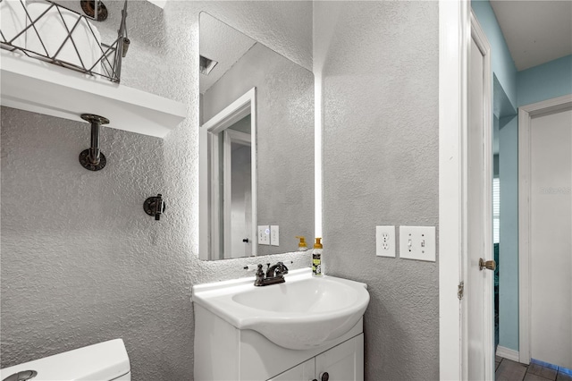3265 Sunrise Trl, Port Charlotte, FL 33952 - bathroom with vanity and a textured wall