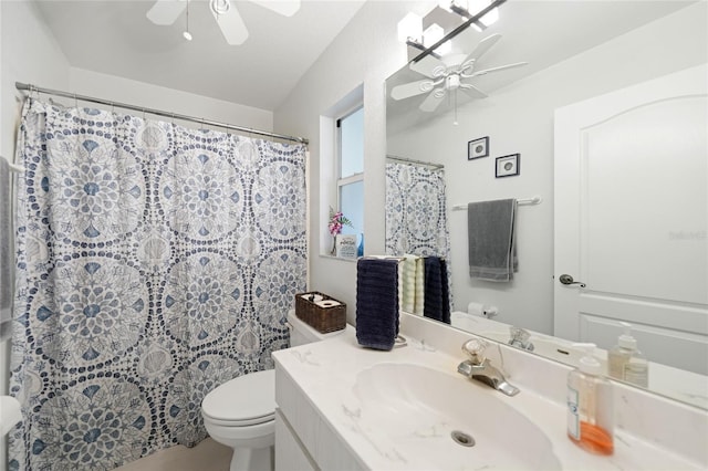 full bath with toilet, ceiling fan, a shower with shower curtain, and vanity