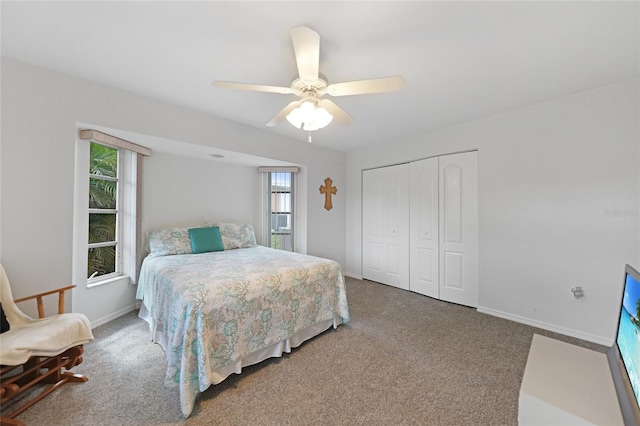 bedroom featuring carpet floors, a closet, and baseboards