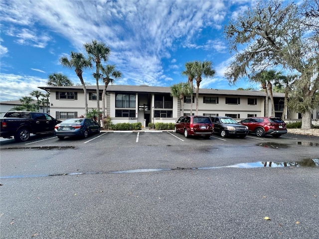 view of front of house with uncovered parking