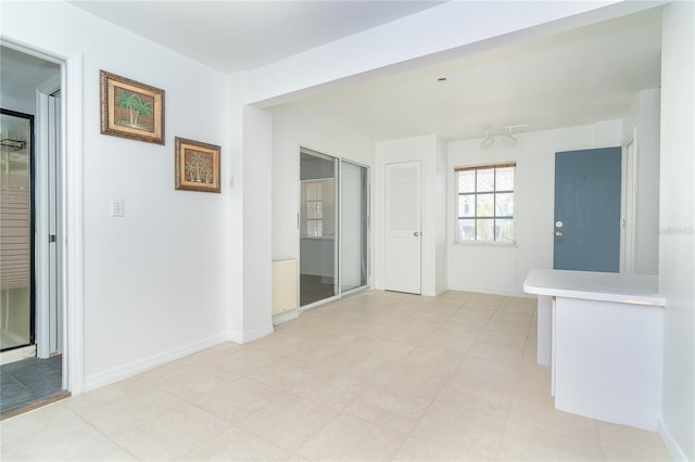 20 Palm Dr, Placida, FL 33946 - hallway featuring baseboards and light tile patterned floors