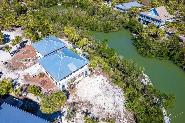 20 Palm Dr, Placida, FL 33946 - drone / aerial view of a large body of water and a tree filled landscape
