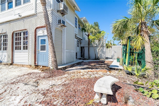 20 Palm Dr, Placida, FL 33946 - view of side of property featuring cooling unit
