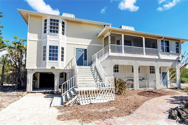 20 Palm Dr, Placida, FL 33946 - beach home featuring covered porch and stairs