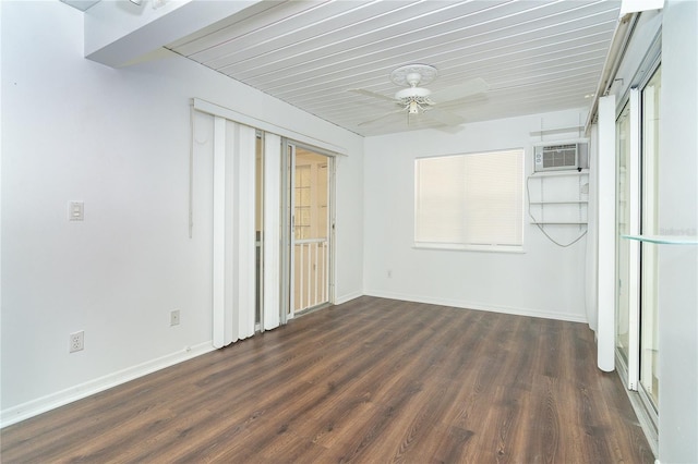 20 Palm Dr, Placida, FL 33946 - spare room featuring a wall mounted AC, wood finished floors, and baseboards