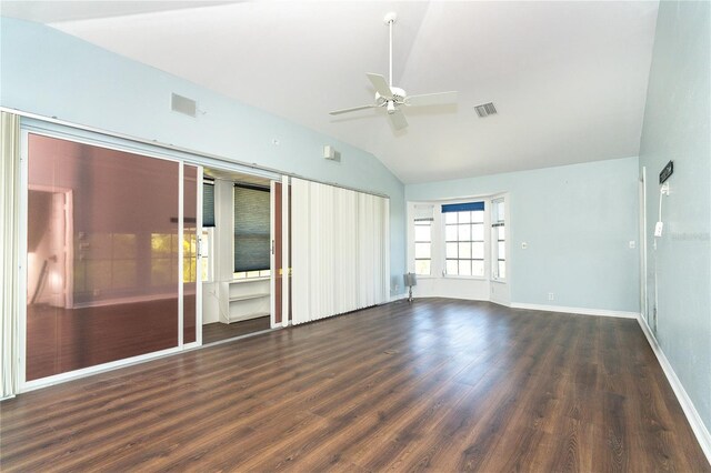 20 Palm Dr, Placida, FL 33946 - unfurnished room with vaulted ceiling, a ceiling fan, wood finished floors, and baseboards