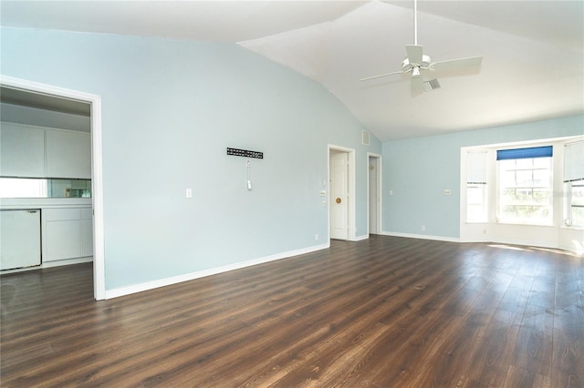 20 Palm Dr, Placida, FL 33946 - unfurnished living room with lofted ceiling, dark wood-type flooring, a ceiling fan, and baseboards