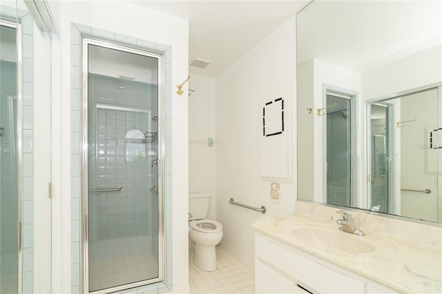 20 Palm Dr, Placida, FL 33946 - full bathroom with vanity, toilet, tile patterned flooring, and a stall shower