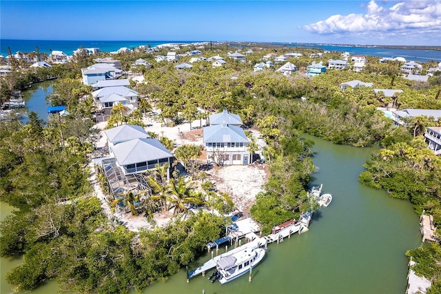 20 Palm Dr, Placida, FL 33946 - aerial perspective of suburban area featuring a nearby body of water