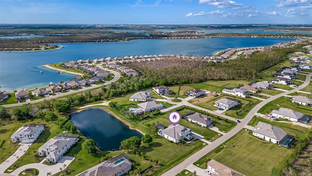 aerial view featuring a water view and a residential view