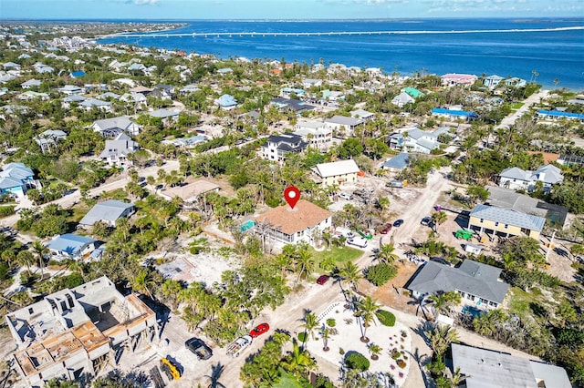 aerial view with a water view and a residential view