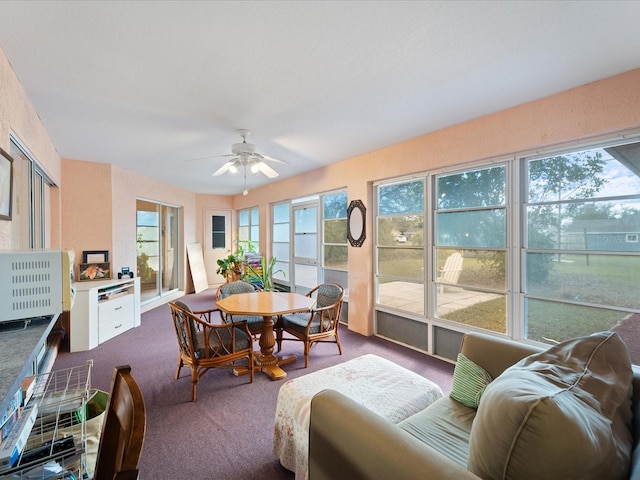 interior space with a ceiling fan