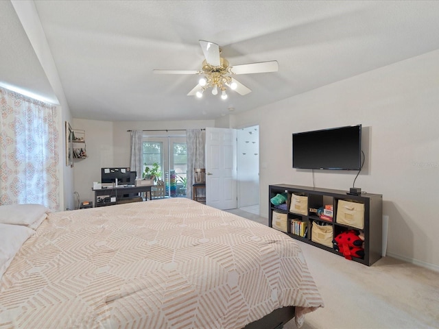 bedroom with carpet flooring, a ceiling fan, baseboards, access to exterior, and french doors