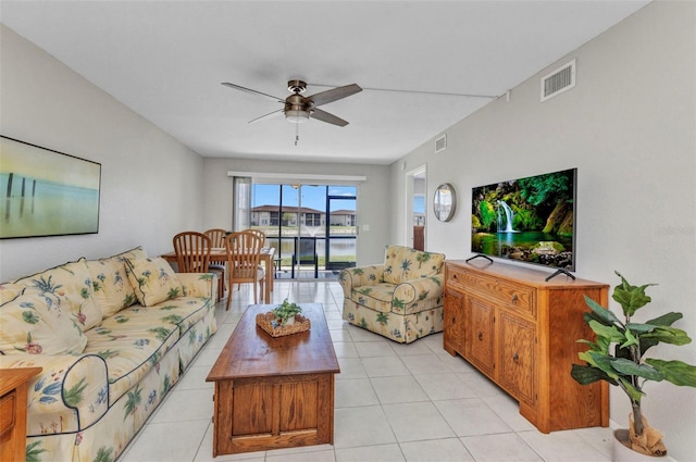 25100 Sandhill Blvd Unit R104, Punta Gorda, FL 33983 - living area with a ceiling fan and light tile patterned floors