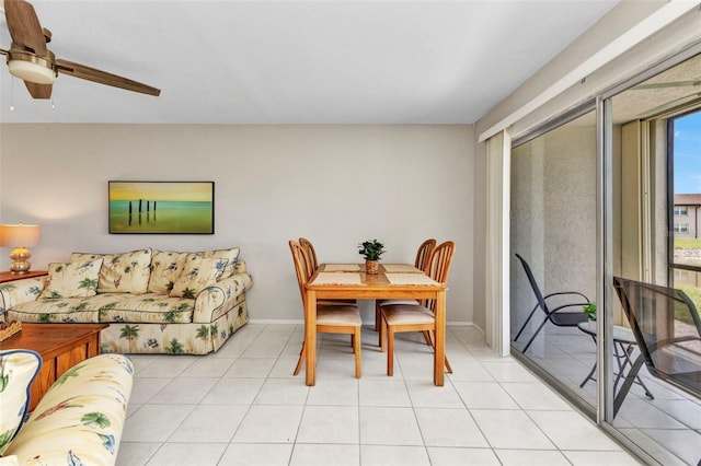 25100 Sandhill Blvd Unit R104, Punta Gorda, FL 33983 - dining area featuring ceiling fan, light tile patterned flooring, and baseboards