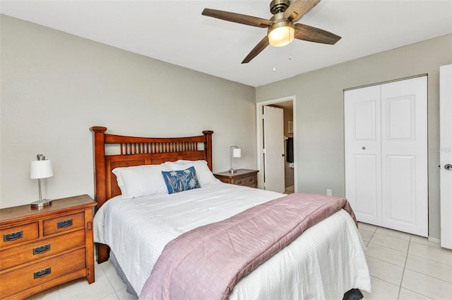 25100 Sandhill Blvd Unit R104, Punta Gorda, FL 33983 - bedroom featuring light tile patterned flooring, a closet, and ceiling fan