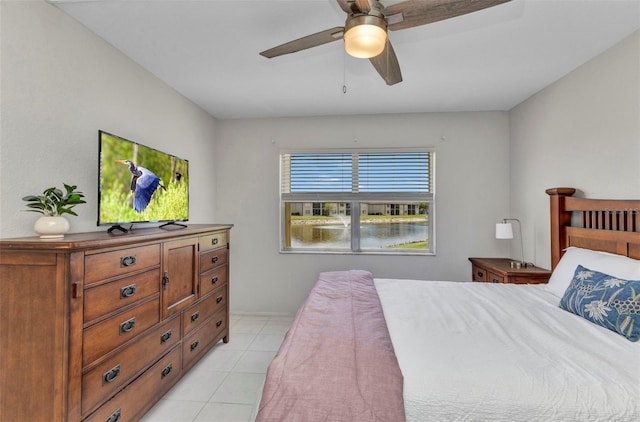 25100 Sandhill Blvd Unit R104, Punta Gorda, FL 33983 - bedroom featuring light tile patterned flooring and a ceiling fan