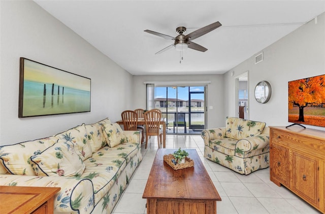 25100 Sandhill Blvd Unit R104, Punta Gorda, FL 33983 - living room with ceiling fan and light tile patterned flooring