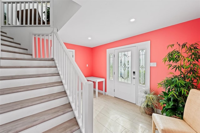 12130 Siesta Dr, Fort Myers Beach, FL 33931 - foyer with recessed lighting, baseboards, and stairs