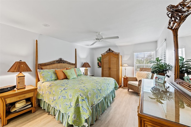12130 Siesta Dr, Fort Myers Beach, FL 33931 - bedroom featuring ceiling fan and wood finished floors