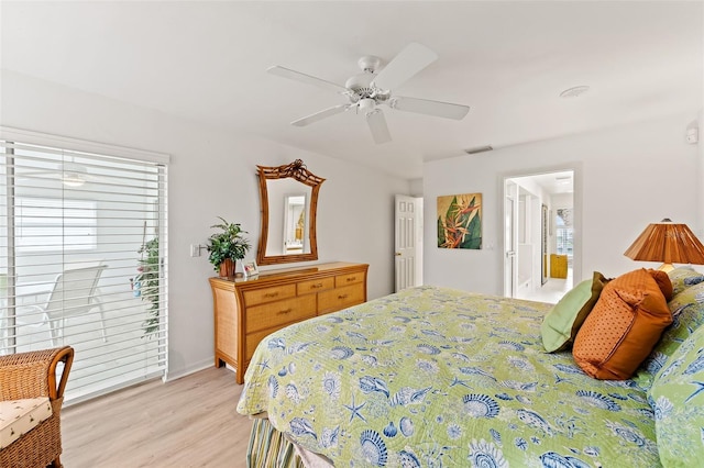 12130 Siesta Dr, Fort Myers Beach, FL 33931 - bedroom featuring a ceiling fan, access to exterior, visible vents, and light wood finished floors