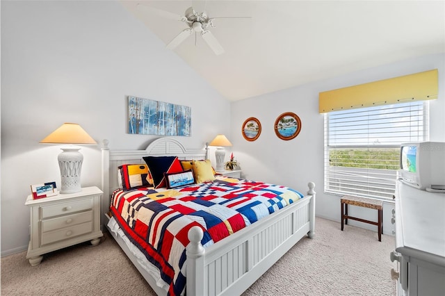 12130 Siesta Dr, Fort Myers Beach, FL 33931 - bedroom with light carpet, lofted ceiling, and a ceiling fan