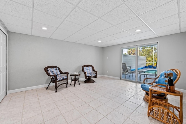 12130 Siesta Dr, Fort Myers Beach, FL 33931 - sitting room with a paneled ceiling, baseboards, and recessed lighting