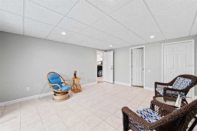 12130 Siesta Dr, Fort Myers Beach, FL 33931 - living area with light tile patterned floors, recessed lighting, a drop ceiling, and baseboards