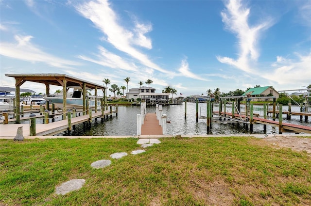 12130 Siesta Dr, Fort Myers Beach, FL 33931 - view of dock with a water view, boat lift, and a yard