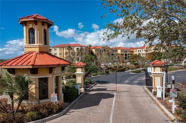 85 Vivante Blvd Unit 8542, Punta Gorda, FL 33950 - view of street featuring a residential view, a gate, curbs, and a gated entry