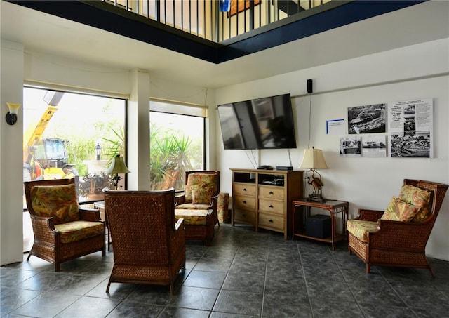 sitting room with tile patterned floors