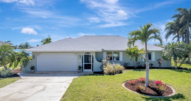 ranch-style home featuring a front yard, an attached garage, and stucco siding