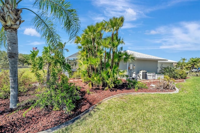 view of yard featuring a lanai