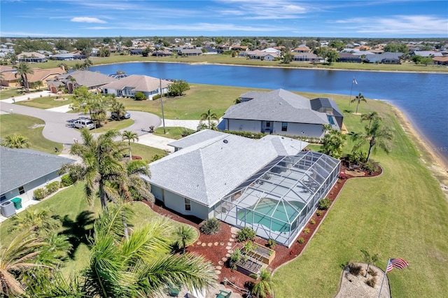 birds eye view of property featuring a residential view and a water view