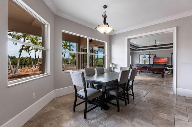 dining area featuring baseboards and ornamental molding