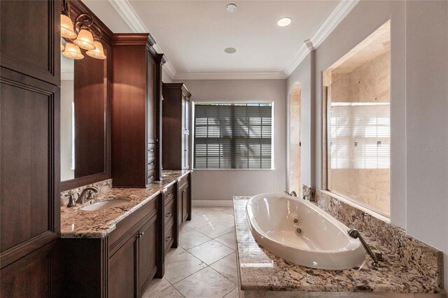 full bath with baseboards, a jetted tub, ornamental molding, and vanity