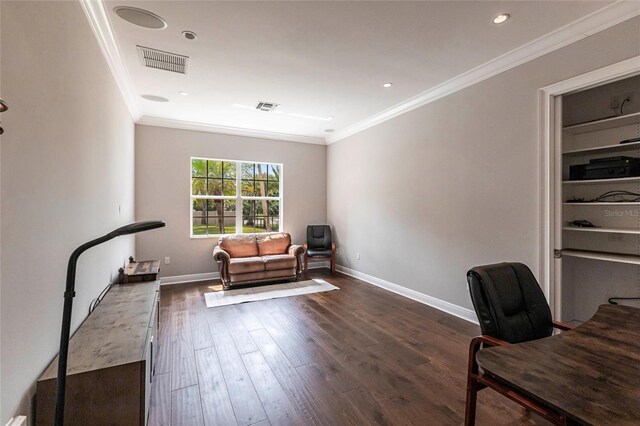 interior space with dark wood finished floors, visible vents, crown molding, and baseboards