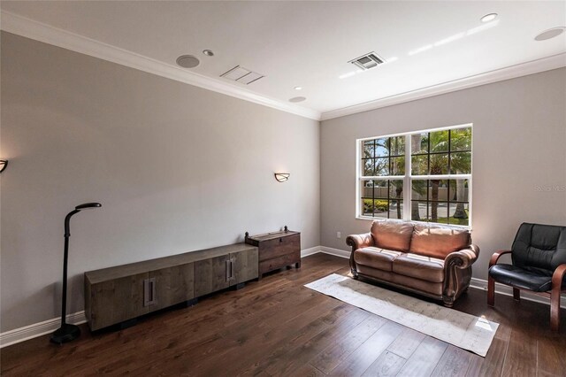 interior space featuring baseboards, dark wood-style floors, visible vents, and ornamental molding