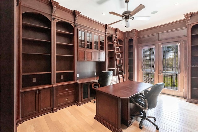 office area with ceiling fan, french doors, and light wood-style flooring