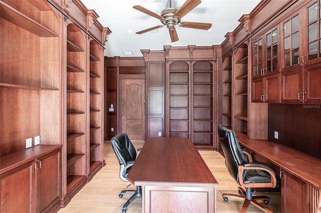 office space featuring a ceiling fan and light wood-style floors