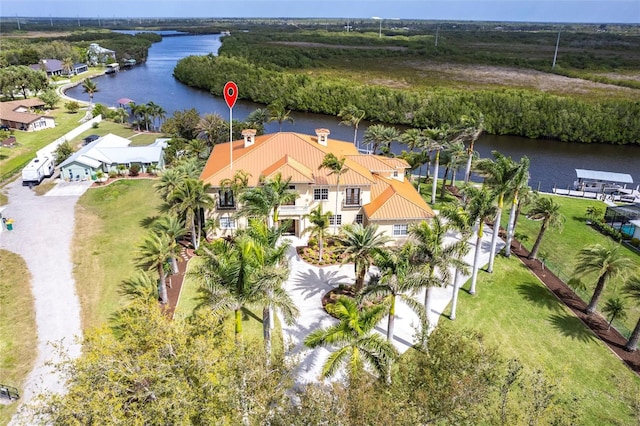 aerial view featuring a residential view and a water view