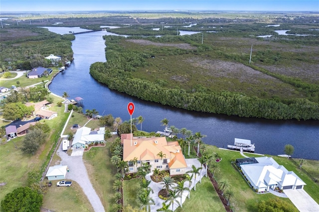 birds eye view of property featuring a water view