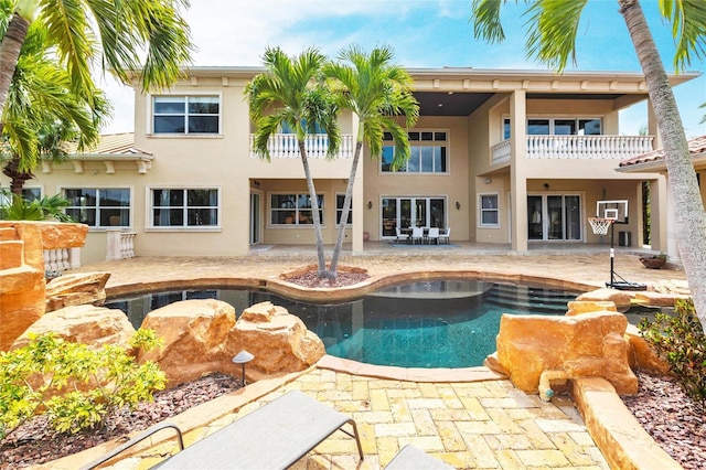 pool featuring a patio area