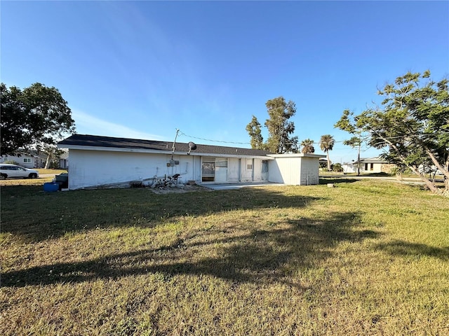 view of front of home with a front yard