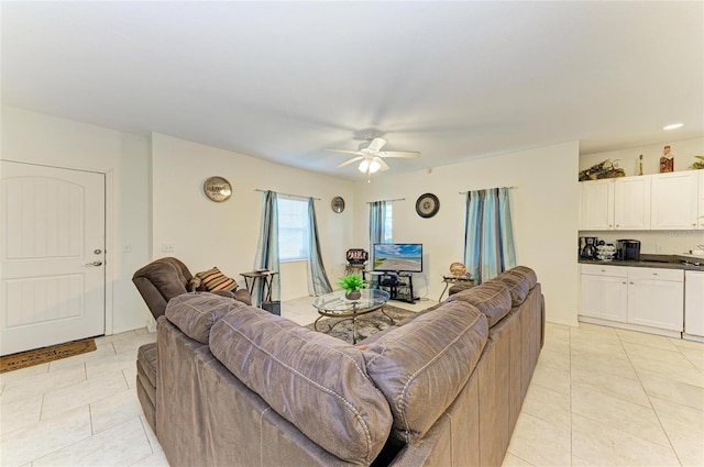 315 Southland Rd, Venice, FL 34293 - living area with a ceiling fan and light tile patterned flooring