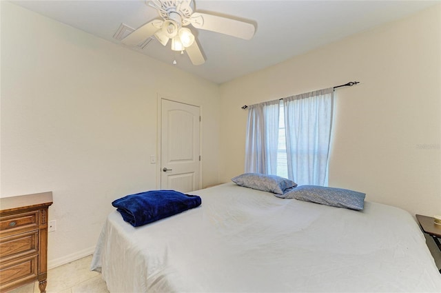315 Southland Rd, Venice, FL 34293 - bedroom with ceiling fan, light tile patterned floors, and baseboards
