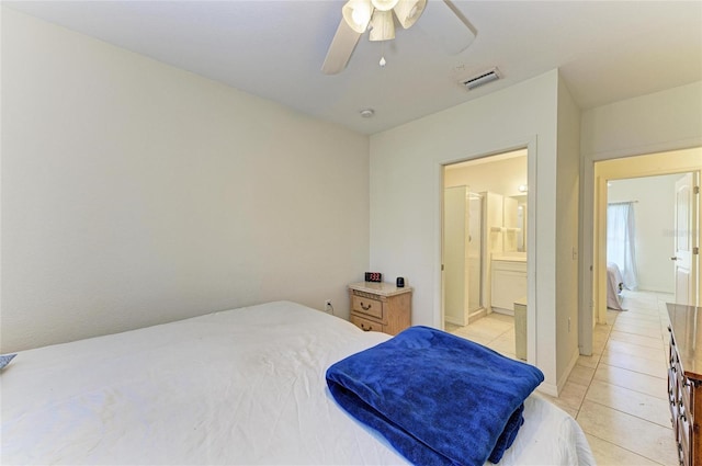 315 Southland Rd, Venice, FL 34293 - bedroom with light tile patterned floors, ceiling fan, visible vents, and ensuite bathroom