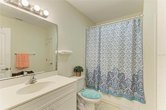 315 Southland Rd, Venice, FL 34293 - full bath featuring visible vents, toilet, shower / tub combo with curtain, tile patterned floors, and vanity