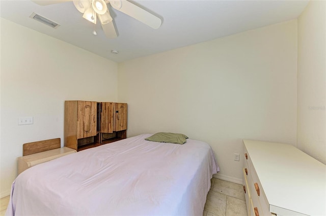315 Southland Rd, Venice, FL 34293 - bedroom with light tile patterned floors, baseboards, visible vents, and a ceiling fan